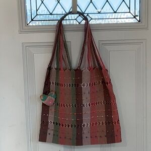 Multicolor Striped Tote Bag very mexicanis vibe has extra heart hung on it.
